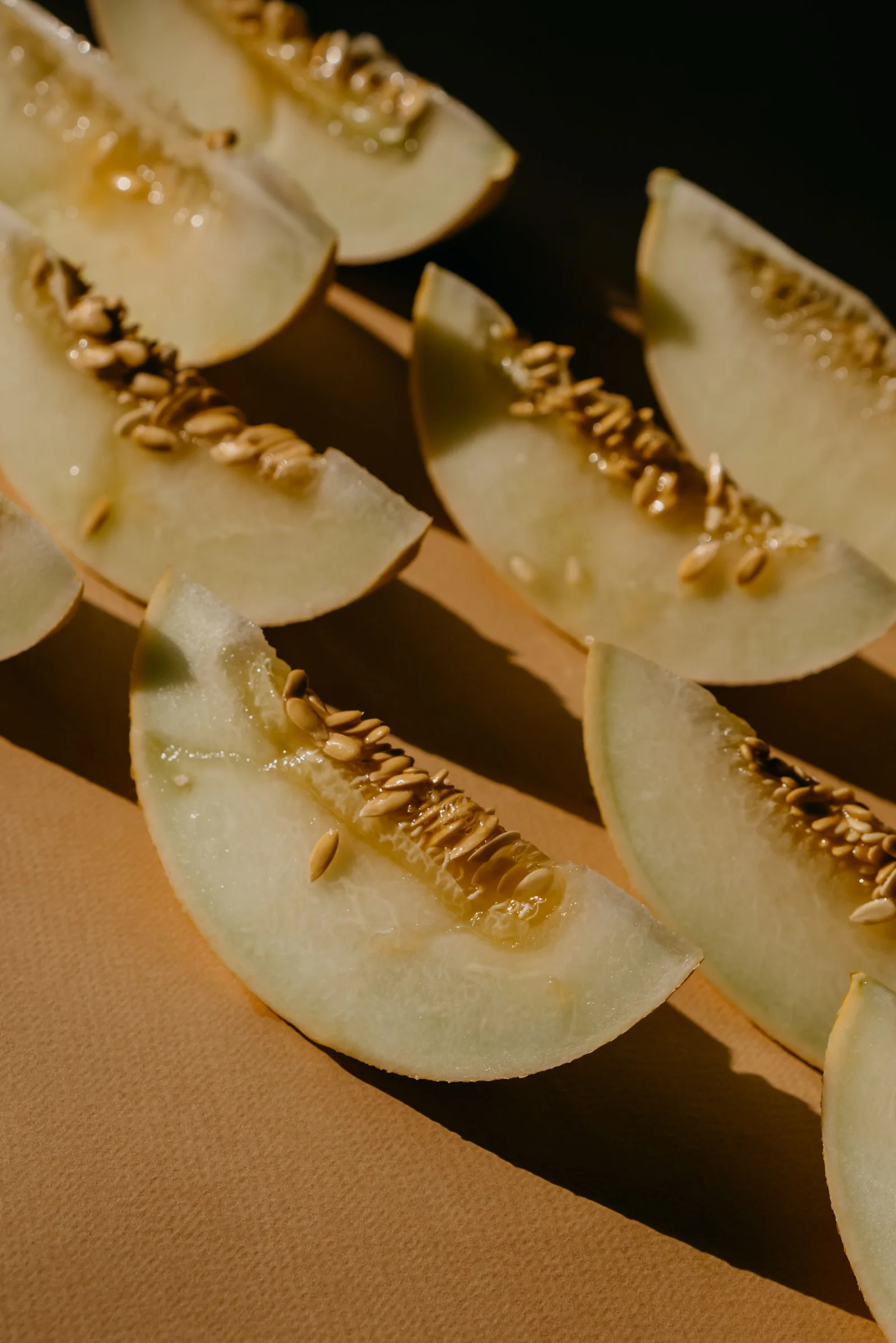 Slices of melon with the seeds visible